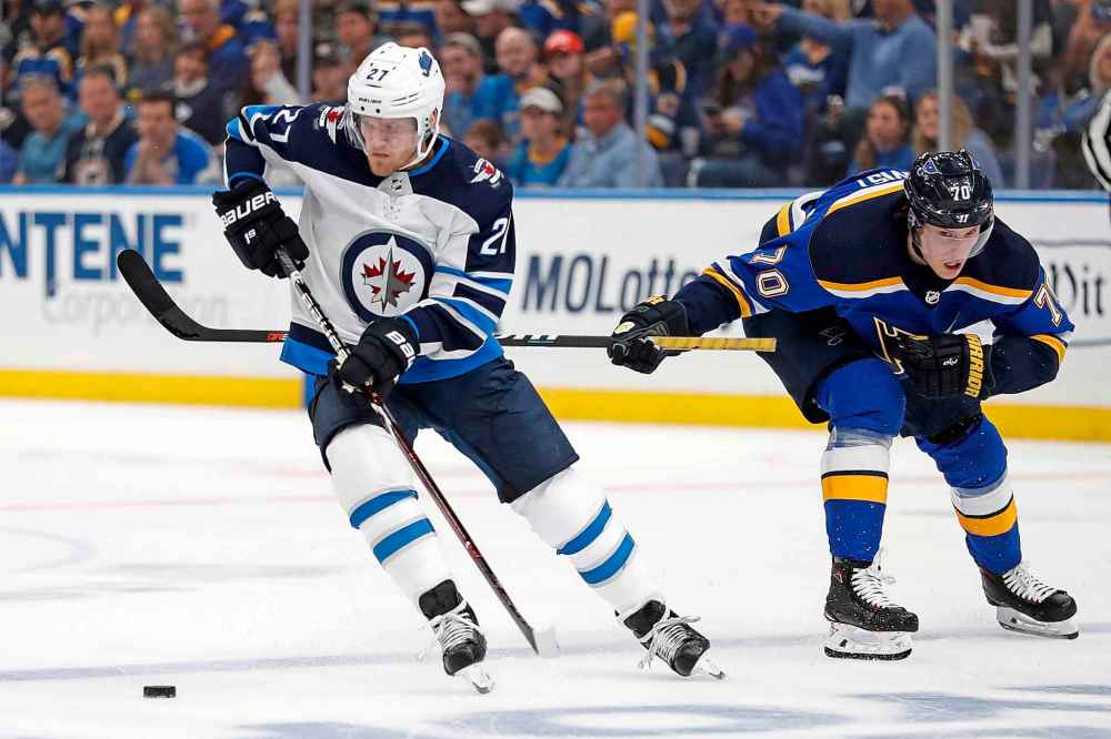 (AP Photo/Jeff Roberson)
Winnipeg Jets left wing Nikolaj Ehlers skates past St. Louis Blues centre Oskar Sundqvist during the first period.