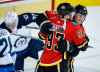 THE CANADIAN PRESS/Jeff McIntosh
Calgary Flames' Sam Bennett, centre, celebrates his goal with teammate Matthew Tkachuk, right, during the first period in Calgary, Wednesday.