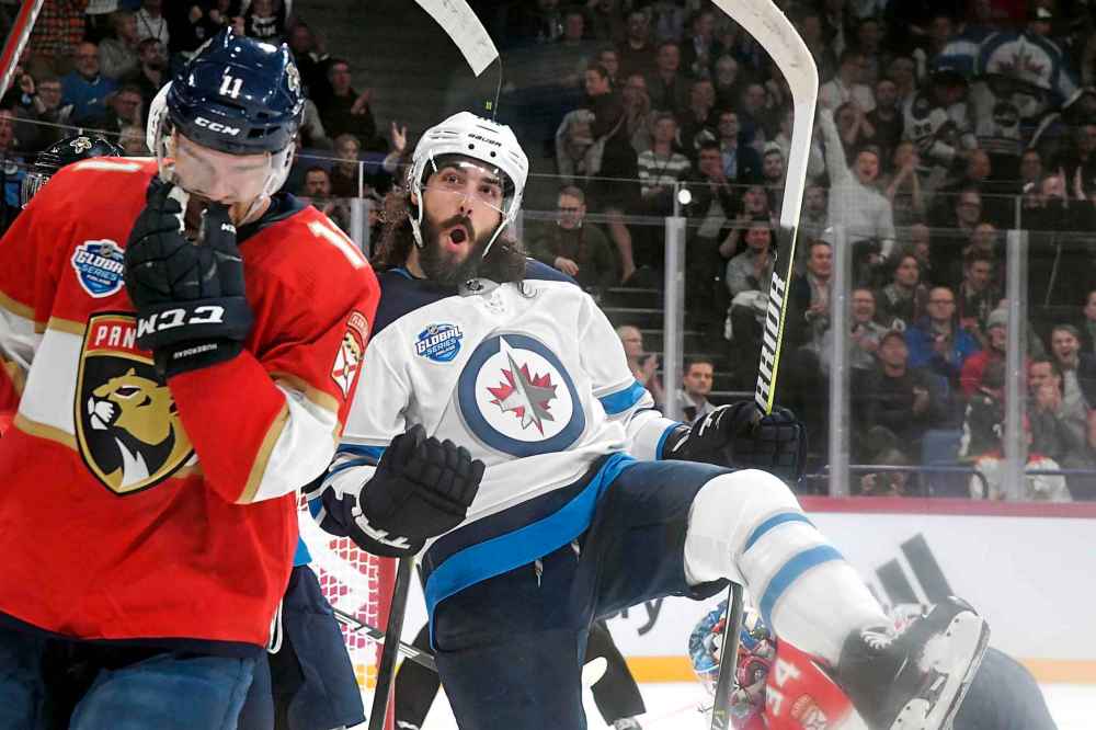 (Martti Kainulainen/Lehtikuva via AP)
Mathieu Perreault of the Winnipeg Jets celebrates after scoring his team's first goal during the NHL Global Series match with the Florida Panthers in Helsinki, Finland on Thursday.