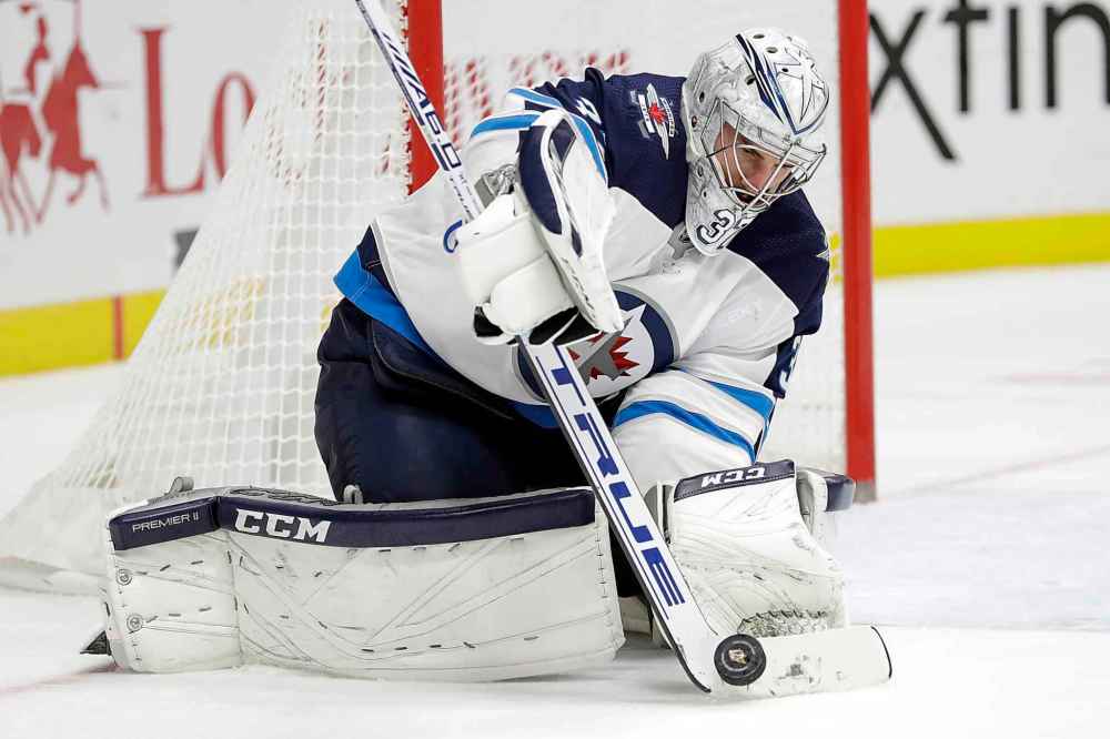 (AP Photo/Mark Humphrey)
Winnipeg Jets goaltender Connor Hellebuyck stops one of the 39 shots by the Nashville Predators in the second period Tuesday.