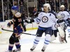 Kathy Kmonicek / The Associated Press
Winnipeg Jets' Mark Stuart reacts after New York Islanders' Kyle Okposo (21) scored against Jets goalie Chris Mason (50) in the second period of an NHL hockey game on Thursday, April 5, 2012, in Uniondale, N.Y.