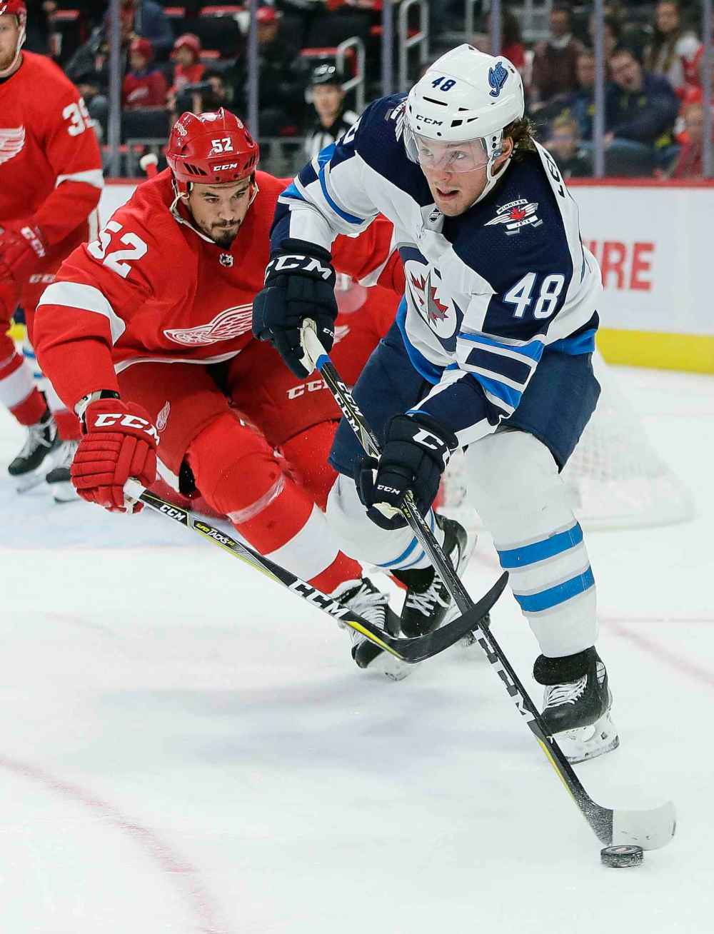 (AP Photo/Duane Burleson)
Detroit Red Wings defenceman Jonathan Ericsson defends against Winnipeg Jets left wing Brendan Lemieux during the first period Friday.
