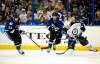 Brian Blanco / The Associated Press
Jets' Blake Wheeler battles for the puck with Tampa Bay Lightning winger Brandon Segal (left) and defenceman Keith Aulie during the first period Saturday in Tampa, Fla.