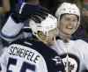 Chris O'Meara / The Associated Press
Winnipeg Jets centre Mark Scheifele and blue-liner Jacob Trouba are making a big impact in the NHL.