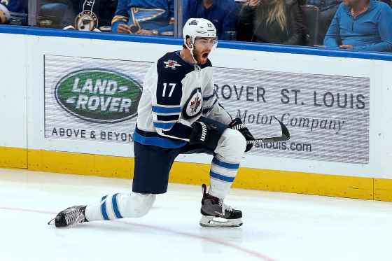 (AP Photo/Scott Kane)Jets center Adam Lowry celebrates after scoring an unassisted short-handed goal during the third period Thursday, in St. Louis.
