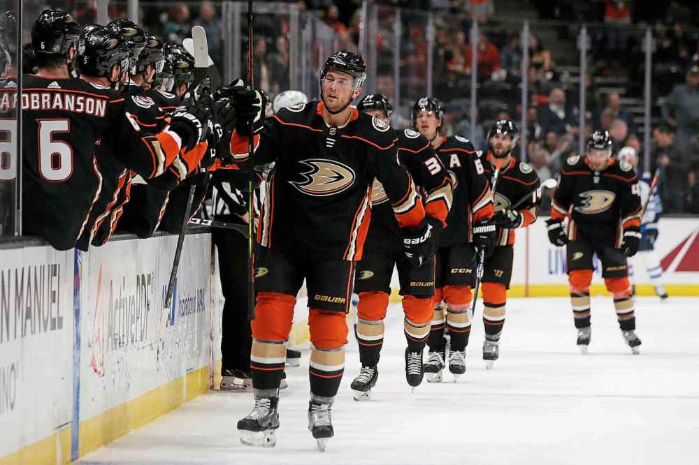 (AP Photo/Alex Gallardo)
Anaheim Ducks defenceman Cam Fowler, centre, gets congratulations from teammates after scoring on the Winnipeg Jets during the first period in Anaheim, Tuesday.