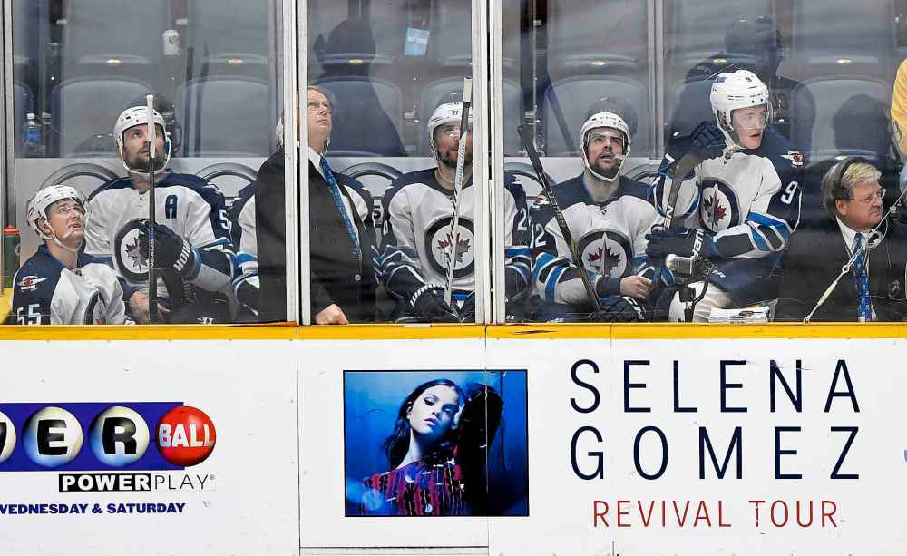 (AP Photo/Mark Zaleski)
Several Winnipeg Jets players sit in the penalty box during a 2015 game against the Nashville Predators.