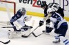 Gene J. Puskar / The Associated Press 
Pittsburgh Penguins' Simon Despres (47) can't get a shot past Winnipeg Jets goalie Ondrej Pavelec (31) with Jacob Trouba (8) defending during the first period in Pittsburgh Tuesday.