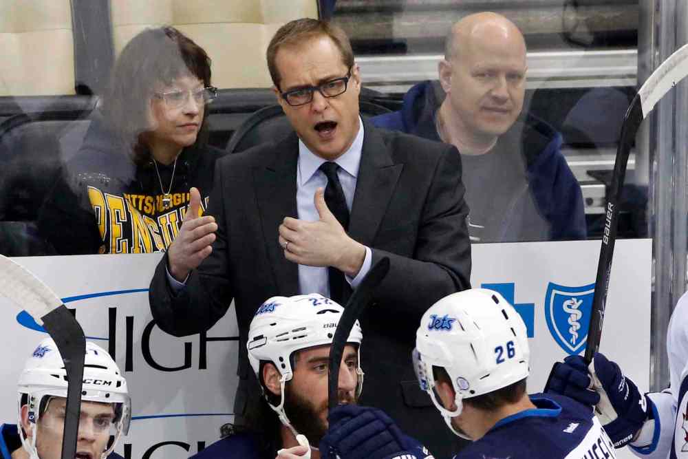 Gene J. Puskar / The Associated Press
Winnipeg Jets coach Paul Maurice talks to his players during the third period of an NHL hockey game against the Pittsburgh Penguins in Pittsburgh on Tuesday, Jan. 27, 2015. The Penguins won 5-3.