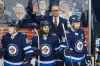 JOHN WOODS / WINNIPEG FREE PRESS
Winnipeg Jets head coach Paul Maurice acknowledges the crowd's standing ovation after he is congratulated for coaching 1,500 NHL games Tuesday against the San Jose Sharks in Winnipeg.