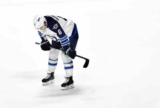 Mark Zaleski / The Associated PressA dejected Alexander Burmistrov leaves the ice after Saturday's humiliating loss to Nashville.
