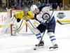 Mark Humphrey / The Associated Press
Nashville Predators goalie Pekka Rinne (35), of Finland, watches as Winnipeg Jets center Bryan Little (18) closes in during the first period of an NHL hockey game Tuesday, Jan. 5, 2016, in Nashville, Tenn.