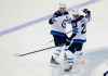 Winnipeg Jets centre Mark Scheifele (left) celebrates with captain Blake Wheeler after scoring the winning goal in the shootout Sunday.
 NOAH MURRAY / THE ASSOCIATED PRESS