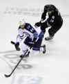 Marcio Jose Sanchez / The Associated Press
Winnipeg defenceman Zach Bogosian (44) is chased by San Jose centre Joe Thornton during first-period action Thursday night.