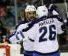 Marcio Jose Sanchez / The Associated Press
Winnipeg Jets' Dustin Byfuglien, left, celebrates his goal with teammate Blake Wheeler (26) during the second period.