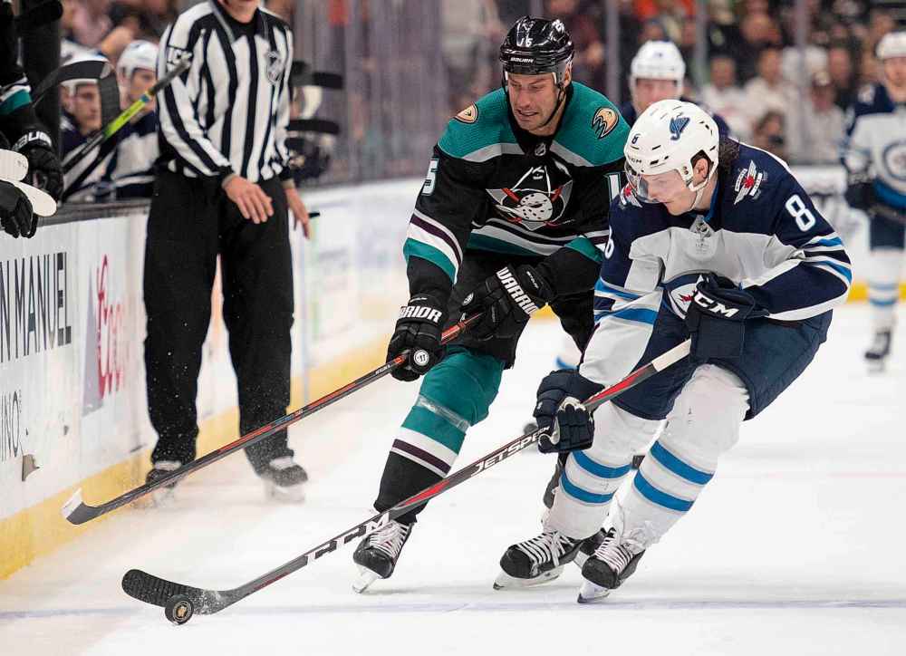 (AP Photo/Kyusung Gong)
Anaheim Ducks centre Ryan Getzlaf, back, chases Winnipeg Jets defenceman Jacob Trouba for the puck during the second period.