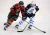 Tom Olmscheid / The Associated Press
Minnesota Wild's Marco Scandella, left, and Winnigeg Jets' Jerome Samson, right, go after the puck in the first period of an NHL hockey game on Saturday, Sept. 21, 2013, in St. Paul, Minn. (AP Photo/Tom Olmscheid)
