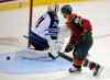 Tom Olmscheid / The Associated Press
Minnesota Wild's Jason Pominville (29) beats Winnipeg Jets goalie Ondrej Pavelec for the winning goal in the shootout. Minnesota won 4-3.