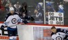 Ann Heisenfelt / The Associated Press 
Winnipeg Jets fans cheer and photograph Jets centre Bryan Little (18) and right wing Blake Wheeler (26) before the Jets' game against the Minnesota Wild in St. Paul, Minn., Monday.