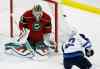 Ann Heisenfelt / The Associated Press
Winnipeg Jets right-winger Nikolaj Ehlers storms in on net to rifle a shot that is deflected by Minnesota Wild goalie Devan Dubnyk Sunday in St. Paul, Minn.