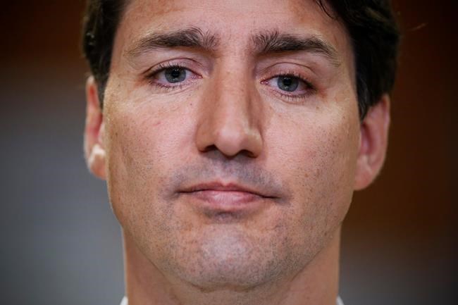 Prime Minister Justin Trudeau is photographed as talks to media after meeting with students and teachers at Manitoba Institute of Trades and Technology (MITT) as he announced Budget 2019's Canada Trading Benefit in Winnipeg Tuesday, March 26, 2019. THE CANADIAN PRESS/John Woods