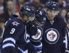 Jason Halstead / Winnipeg Free Press files
Winnipeg Jets forward Mark Scheifele (middle) has a sprained medial collateral ligament in his right knee. Fortunately, it will not require surgery.