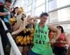 Jason Halstead / Winnipeg Free Press
Michaela Rebus (left), of Edmonton, and Winnipegger Matthew Giesbrecht have some fun while waiting for the doors to open at the MTS Centre for the Lady Gaga concert on Thursday night.