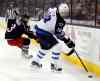 Paul Vernon / The Associated Press
Winnipeg Jets' Bryan Little, right,  works for the puck against Columbus Blue Jackets' Cam Atkinson during the first period of an NHL hockey game in Columbus, Ohio, Saturday.