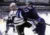 JOHN WOODS / WINNIPEG FREE PRESS
Winnipeg Jets forward Adam Lowry (17) checks Justin Williams of the Los Angeles Kings during second-period NHL action at the MTS Centre in Winnipeg Sunday.
