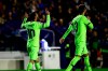 FC Barcelona's forward Lionel Messi, left, celebrate after scoring the 0-4 goal with his teammate FC Barcelona's defender Gerard Pique, right, during their La Liga soccer match between Levante UD and FC Barcelona at Ciutat de Valencia stadium in Valencia, Spain, Sunday, Dec. 16, 2018. (AP Photo/Jose Miguel Fernandez de Velasco)
