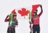 Gold medalist Kelsey Serwa, right, and silver medalist Brittany Phelan both of Canada celebrate following the women's ski cross final at the Phoenix Snow Park at the 2018 Winter Olympic Games in Pyeongchang, South Korea, Friday, Feb. 23, 2018. THE CANADIAN PRESS/Jonathan Hayward