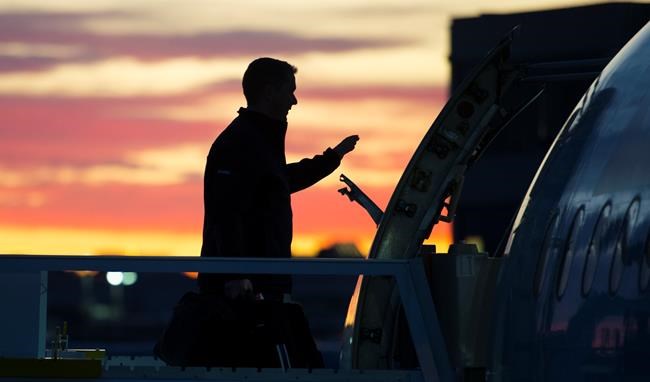 Conservative leader Andrew Scheer boards his campaign plane in Montreal Thursday, October 3, 2019. THE CANADIAN PRESS/Jonathan Hayward