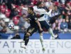 Vancouver Whitecaps defender Jake Nerwinski (28) heads the ball with Los Angeles FC defender Mohamed El-Munir (13) during the second half of MLS soccer action in Vancouver, B.C. Wednesday, April 17, 2019. THE CANADIAN PRESS/Jonathan Hayward