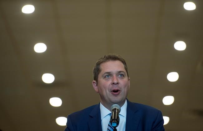Conservative leader Andrew Scheer takes part in a round table discussion during a campaign stop in Mississauga, Ont. Tuesday, October 8, 2019. THE CANADIAN PRESS/Jonathan Hayward