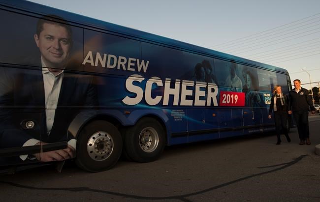 Conservative leader Andrew Scheer and his wife Jill arrive for a campaign stop in Mississauga, Ont. Tuesday, October 8, 2019. THE CANADIAN PRESS/Jonathan Hayward