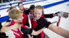 Team Switzerland celebrates their win following the gold medal game against Japan at the women's world curling championship in Swift Current, Sask. Sunday, March 27, 2016. THE CANADIAN PRESS/Jonathan Hayward