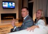 People's Party of Canada Leader Maxime Bernier and his wife Catherine Letarte watches elections results on television Monday, October 21, 2019 in Beauceville, Que. Canadians are going to the polls in a general election. THE CANADIAN PRESS/Jacques Boissinot