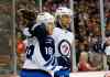 PAUL SANCYA / THE ASSOCIATED PRESS
Winnipeg Jets centre Bryan Little (18) celebrates his first-period goal against the Detroit Red Wings with linemate Blake Wheeler.