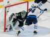 ANDY CLAYTON-KING / THE ASSOCIATED PRESS 
Winnipeg Jets defenceman Josh Morrissey caps off a shift played almost entirely without a stick with the overtime winner against Devan Dubnyk.