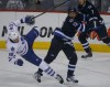 Melissa Tait / Winnipeg Free Press
Jets' forward Dustin Byfuglien knocks down Leafs' forward Troy Bodie in the second period at MTS Centre Saturday night.