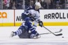 Chris Young / The Canadian Press Archives
Winnipeg Jets' Derek Meech (right) battles for the puck with Toronto Maple Leafs' Matt Frattin.