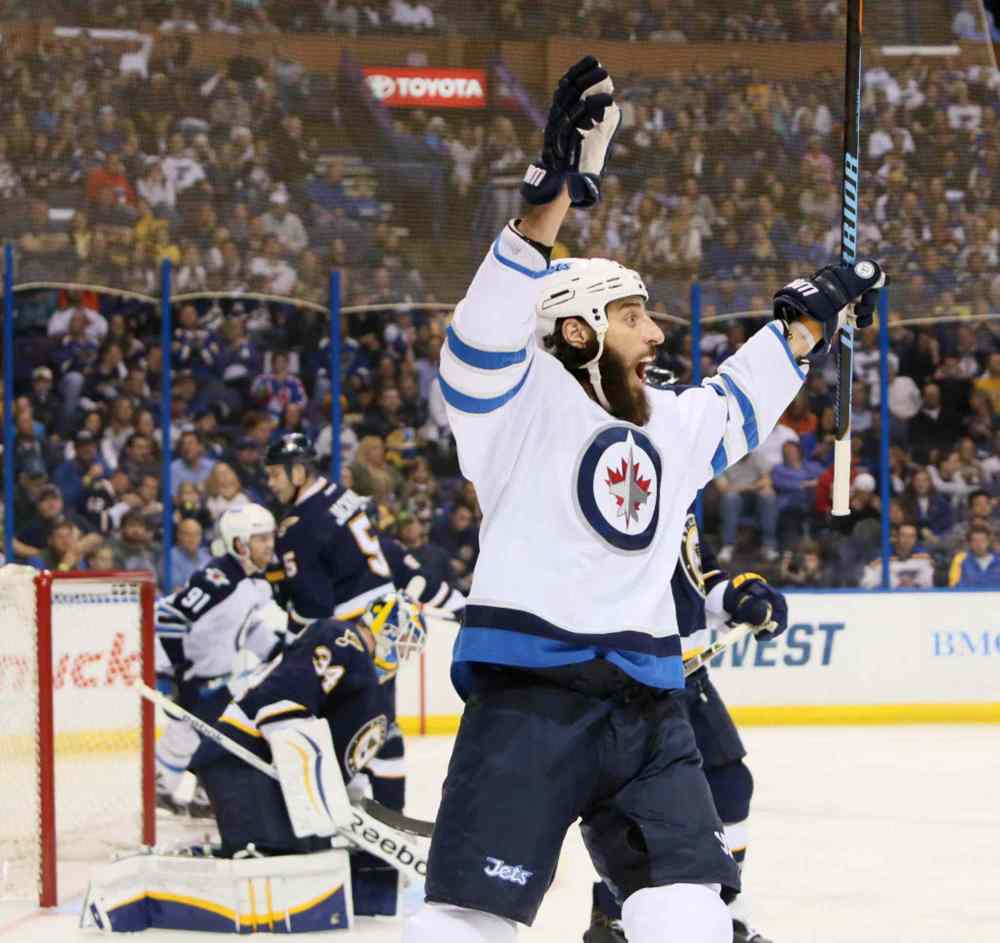Chris Lee / St. Louis Post-Dispatch / The Associated Press
Winnipeg Jets right wing Chris Thorburn reacts after scoring during the second period of Tuesday's game against the St. Louis Blues in St. Louis. It turned out to be the game-winning goal as the Jets shut out the Blues 1-0.