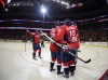 Nick Wass / The Associated Press
In this picture taken with a fisheye lens, Washington Capitals centre Nicklas Backstrom (19) celebrates his goal with Mike Green (52) and Alex Ovechkin, back left, during the second period of their game against the Jets Thursday. The Capitals won 5-1.