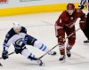 Rick Scuteri / The Associated Pres
Arizona Coyotes defenceman Connor Murphy (5) checks Winnipeg Jets centre Bryan Little (18) in the second period of Thursday's game. The Coyotes won 4-1.