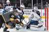 Vegas Golden Knights right wing Reilly Smith (19) shoots against Winnipeg Jets goaltender Laurent Brossoit during the second period of an NHL hockey game Saturday, Nov. 2, 2019, in Las Vegas. (AP Photo/David Becker)
