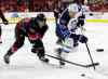 Carolina Hurricanes' Riley Nash (20) battles with Winnipeg Jets' Mark Scheifele (55) for the puck during the first period of an NHL hockey game, Tuesday, Feb. 16, 2016, in Raleigh, N.C. (AP Photo/Karl B DeBlaker)