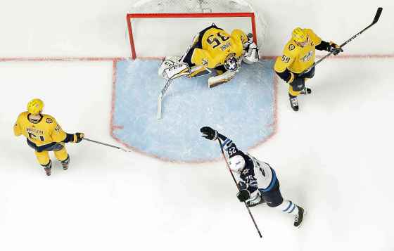 CPWinnipeg Jets center Paul Stastny (25) celebrates after teammate Tyler Myers, not shown, scored a goal against Nashville Predators goalie Pekka Rinne (35), of Finland, during the first period in Game 7 of an NHL hockey second-round playoff series Thursday, May 10, 2018, in Nashville, Tenn. Also defending for the Predators are Austin Watson (51) and Roman Josi (59), of Switzerland. (AP Photo/Mark Humphrey)