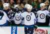 Tony Gutierrez / The Associated Press
Winnipeg Jets' Blake Wheeler (26) is congratulated by the bench after Wheeler scored against the Dallas Stars in the first period of an NHL hockey game, Thursday, Feb. 25, 2016, in Dallas.