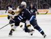 JOHN WOODS / WINNIPEG FREE PRESS
Winnipeg Jets forward Evander Kane attempts to get around Boston Bruins defenceman Dennis Seidenberg during second-period NHL action at the MTS Centre in Winnipeg on Tuesday night. The Jets scored three goals in the third period to defeat the Bruins 3-1.