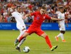 Panama midfielder Marcos Sanchez (8) pressures U.S. forward Tyler Boyd (21) during the second half of a CONCACAF Gold Cup soccer match in Kansas City, Kan., Wednesday, June 26, 2019. The United States won 1-0. (AP Photo/Colin E. Braley)